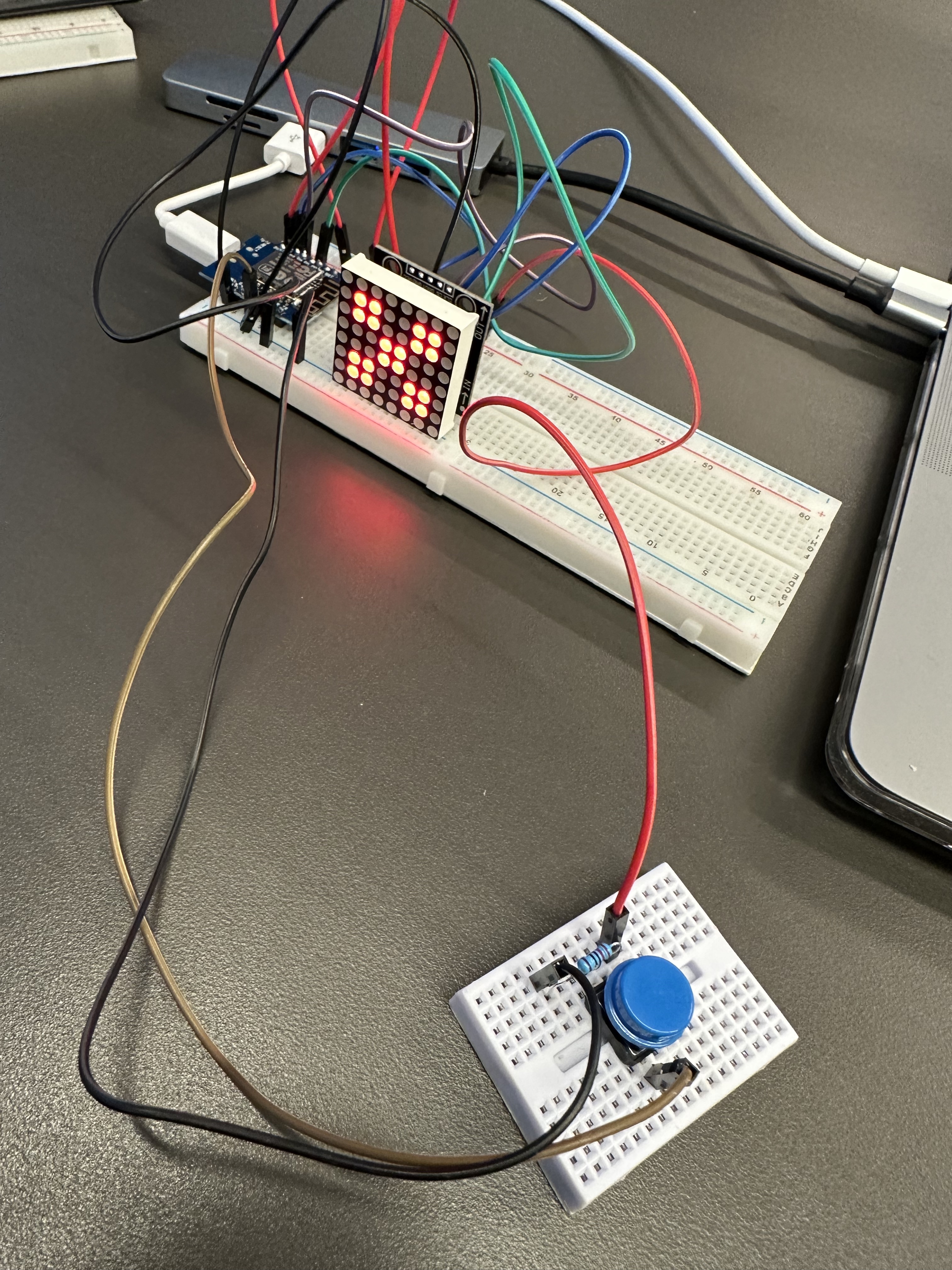 Hardware overview with dot segment display and push button - front side